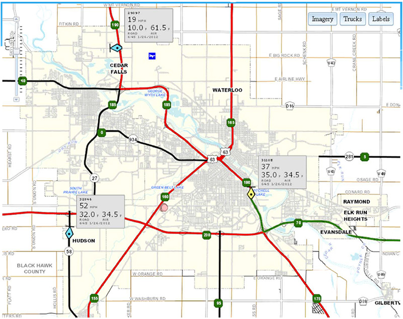 Screenshot from Iowa DOT's Snow Plow Portal showing real-time data (time, vehicle speed, air temperature, and road temperature) collected from three vehicles in the Waterloo, Iowa area.