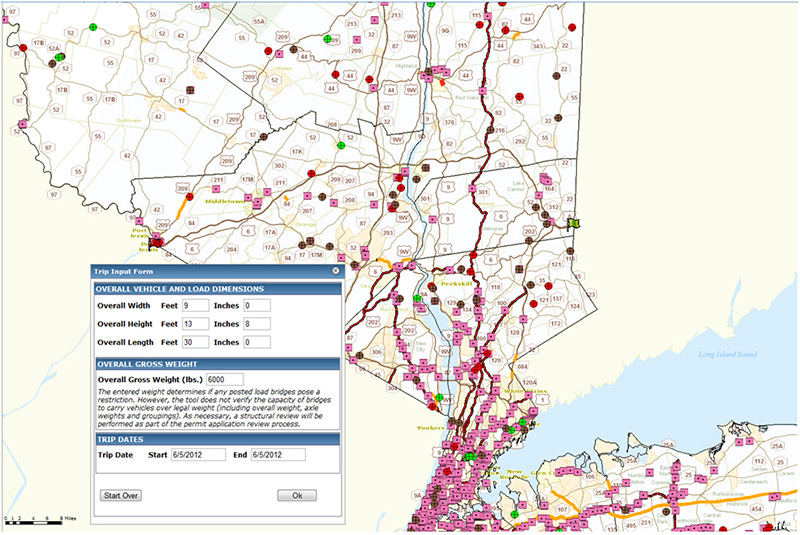 Screenshot from the NYSDOT Oversize/Overweight Tool showing the vehicle dimension entry form superimposed over a map of Manhattan, Long Island, and southern New York State with pink and green squares to show potential bridge restrictions for a vehicle of the size that was input to the form. The form allows the user to input vehicle dimensions, overall gross vehicle weight, and trip dates.